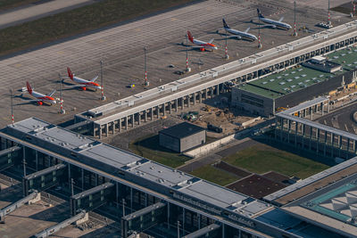 High angle view of airplane on airport runway