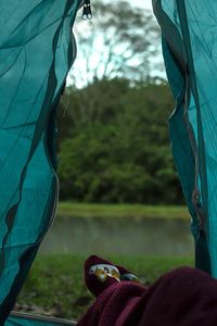 Low section of person on field