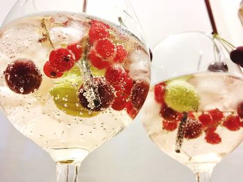 Close-up of strawberries on glass table