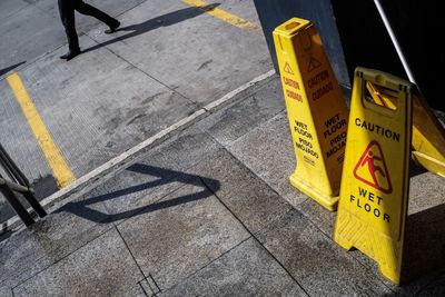 Yellow text on zebra crossing