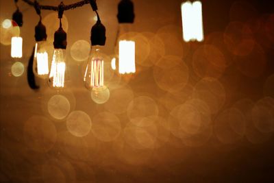 Light bulbs in illuminated room