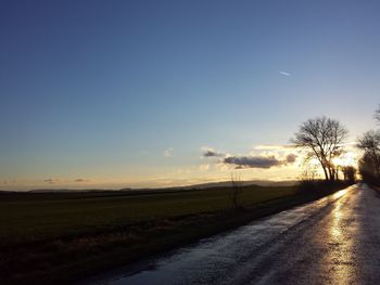 Scenic view of landscape against sky during sunset