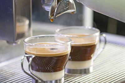 Close-up of coffee served on table