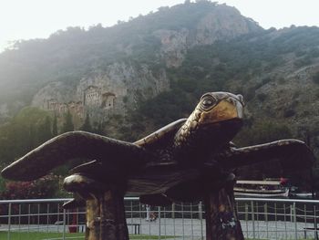 View of an animal sculpture against plants