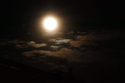 Low angle view of moon in sky at night