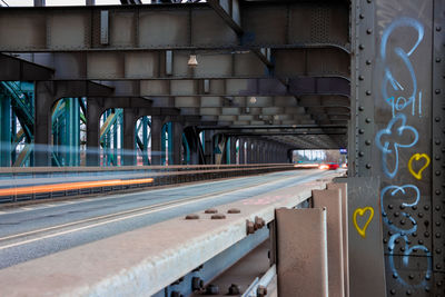 View of light trail on bridge in city