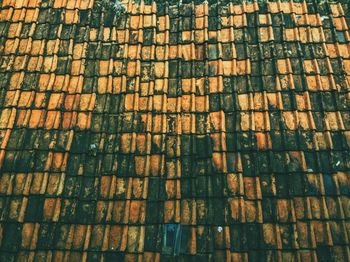 High angle view of weathered roof tiles