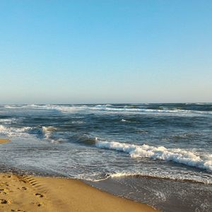 Scenic view of sea against clear sky