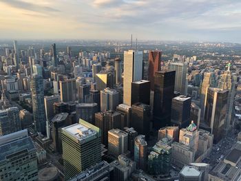 Aerial view of modern buildings in city against sky