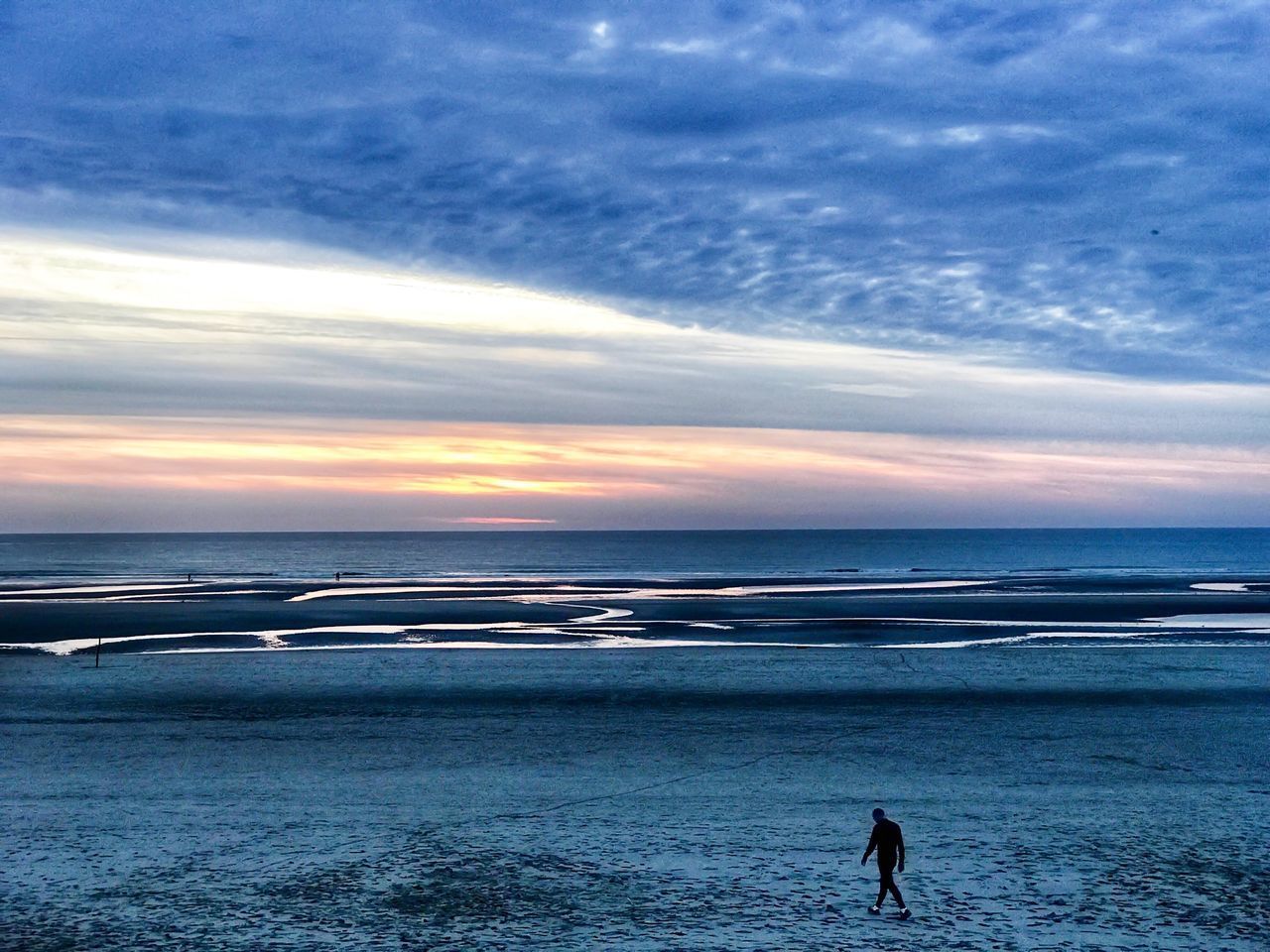 SCENIC VIEW OF SUNSET OVER SEA