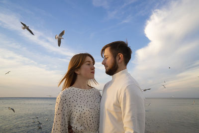 Kaliningrad, russia. young couple in love on the seaside