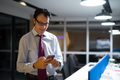 Young man using mobile phone