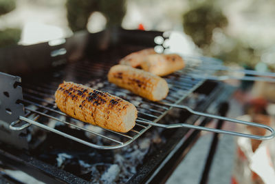 Close-up of corn on barbecue grill