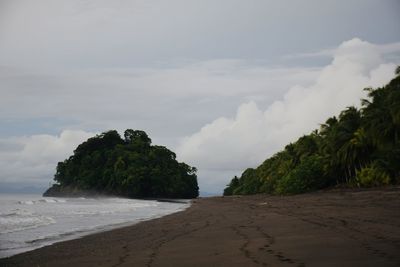 Scenic view of beach against sky