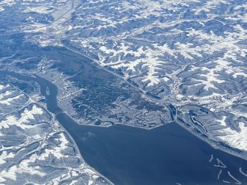 Aerial winter snow landscape rural   minnesota and indianapolis contrast between snow covered fields