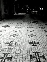 Narrow walkway at night