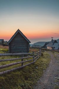 Scenic view of field against sky during sunset