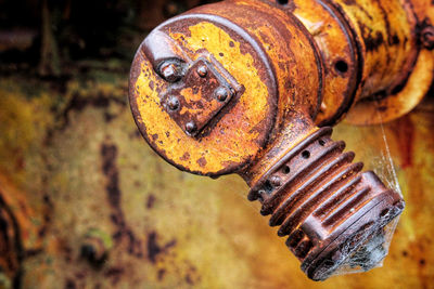 Close-up of old rusty machine part