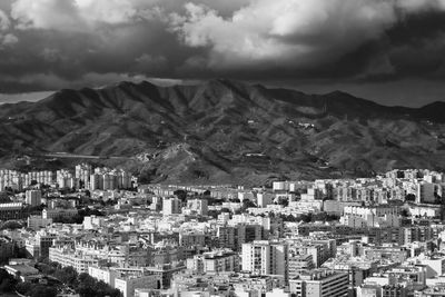 Aerial view of cityscape against sky