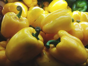 Close-up of yellow bell peppers for sale in market