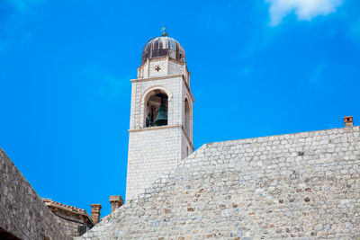 Clock tower of dubrovnik old town seen from the city old port