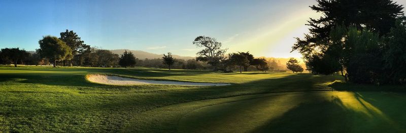 View of golf course against sky