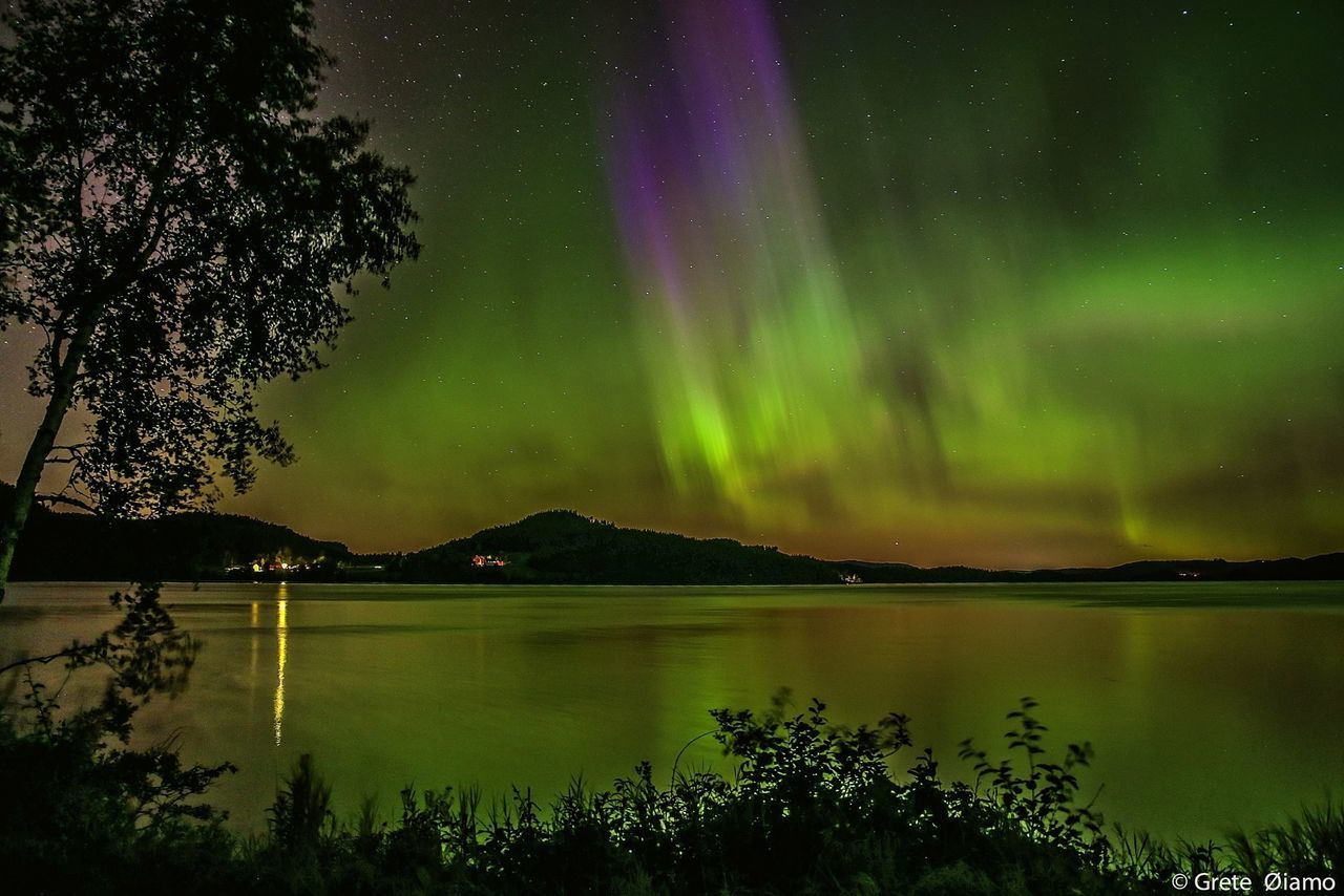 SCENIC VIEW OF LAKE AT NIGHT