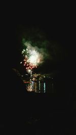 Firework display at night