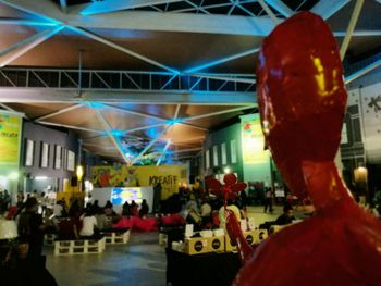 Silhouette of people in amusement park
