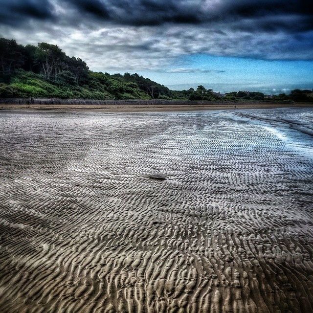 sky, cloud - sky, tranquil scene, tranquility, landscape, cloudy, nature, scenics, beauty in nature, cloud, tree, non-urban scene, field, sand, weather, remote, outdoors, day, no people, idyllic