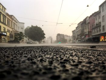 Surface level of road along buildings