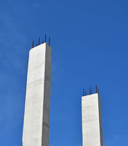 Low angle view of building against clear blue sky