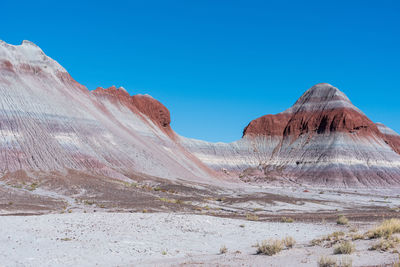 Landscape of barren striped hills or badlands at petrified forest national park in arizona