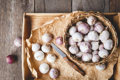 High angle view of eggs in basket on table