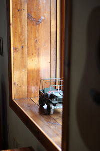 Chair on table by window at home