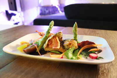 Close-up of meal served on table