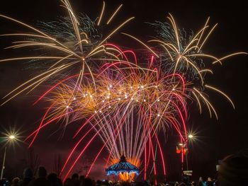 Firework display at night