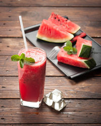 High angle view of fruits in glass on table