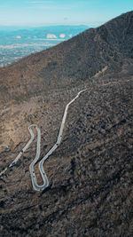 Aerial view of a mountain road against sky