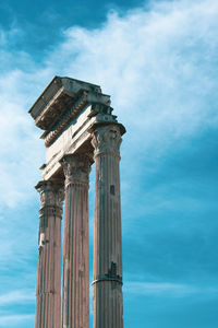 Low angle view of historical building against sky. roman columns.