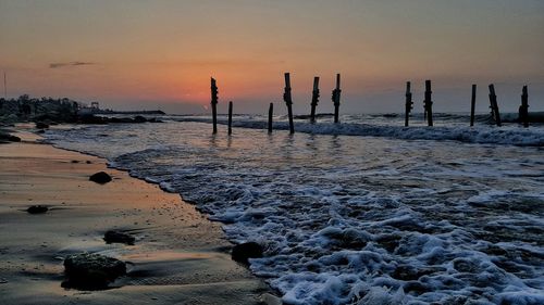 Scenic view of sea against sky during sunset