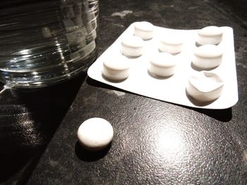 Close-up of chess pieces on table