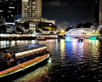 Buildings in city at night