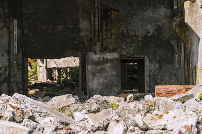 Old abandoned house by building