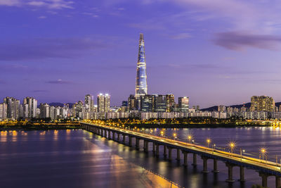 Illuminated buildings in city at night