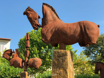 View of horse sculpture against clear blue sky