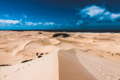 Scenic view of desert against sky