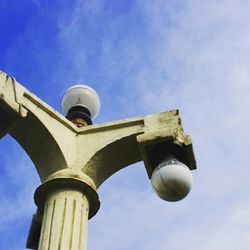 Low angle view of built structure against blue sky