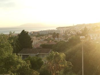 Scenic view of town against clear sky