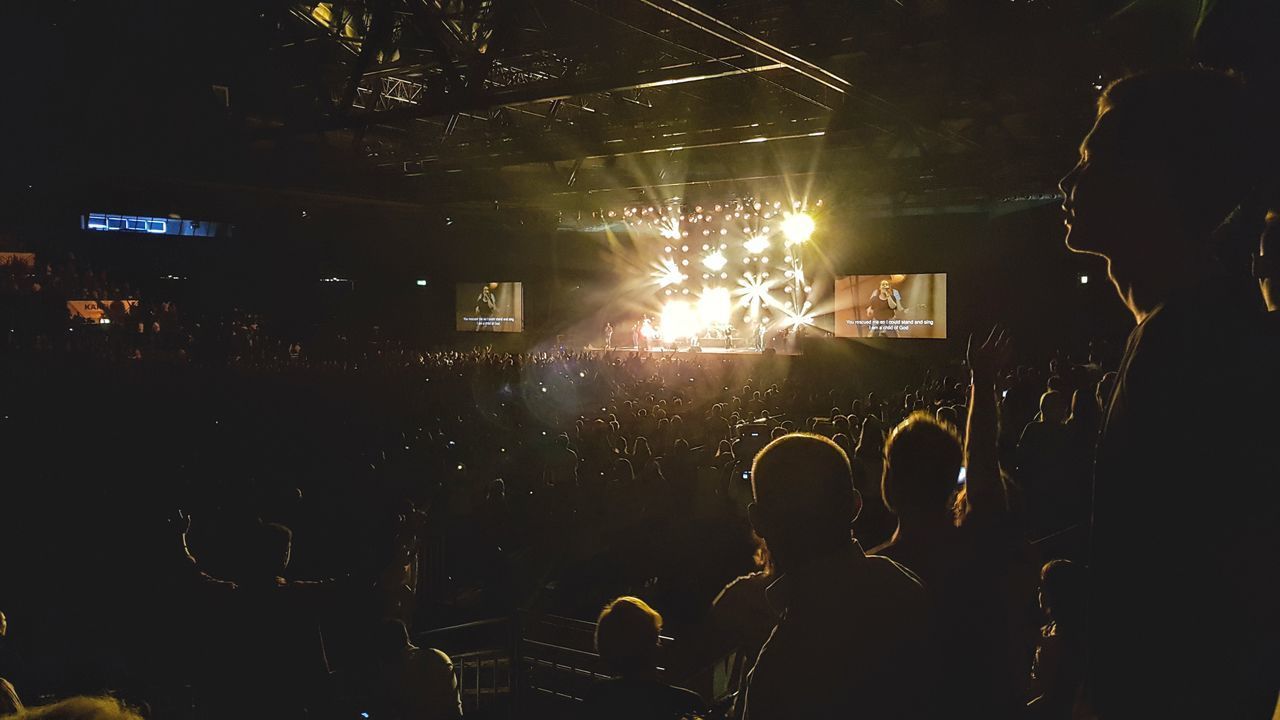 PEOPLE ENJOYING MUSIC CONCERT